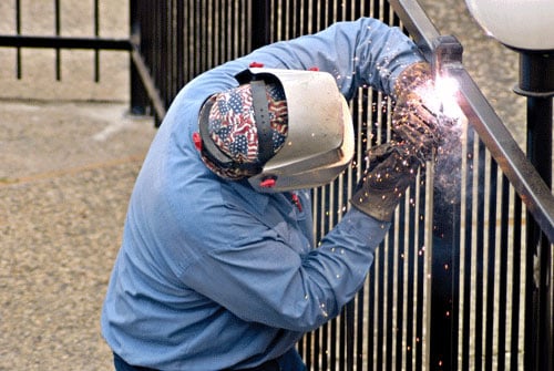 Welding Iron Fence Panels to the Posts