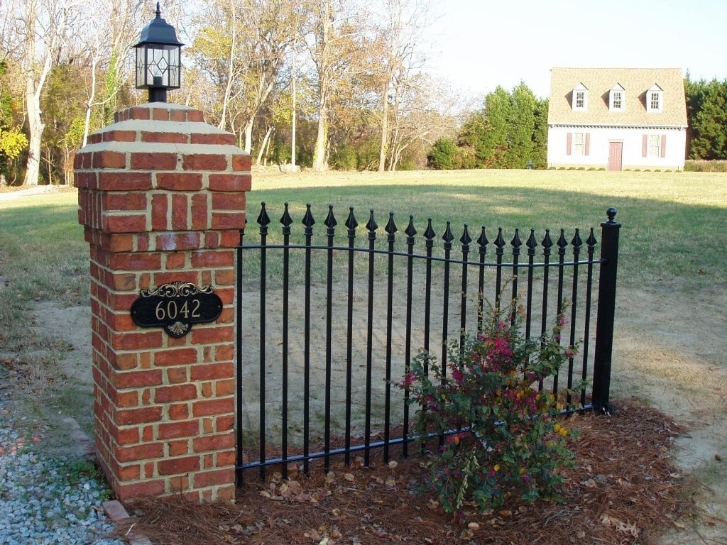 Custom Entryway Arched Panel Attached to Brick Pillar