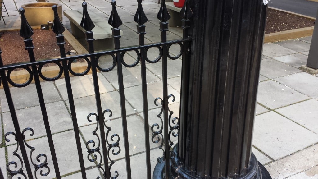 Signature Iron Fence with Add-On Decorations