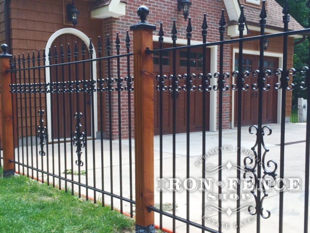 Wrought Iron Fence with Add-on Decorations Mounted on Wood Posts 