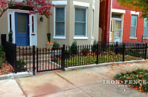 3ft Tall Stronghold Iron Fence Panels in Classic Style Around a Courtyard