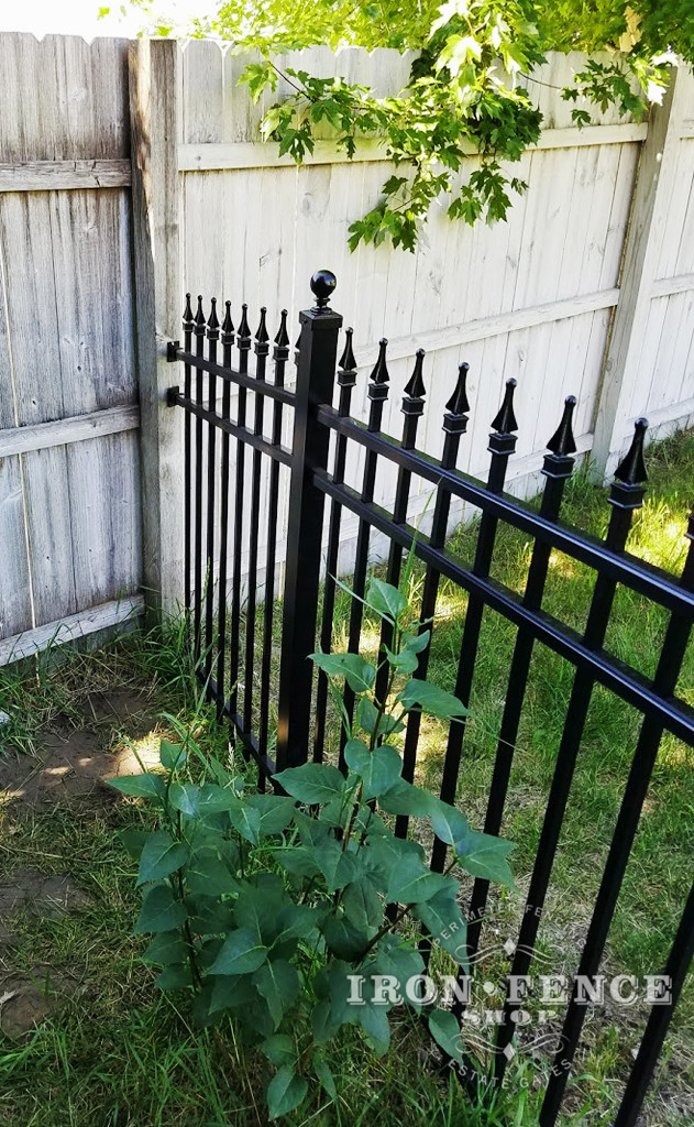 Aluminum Fence Installed into a Pre-existing Wood Fence with Wall Brackets