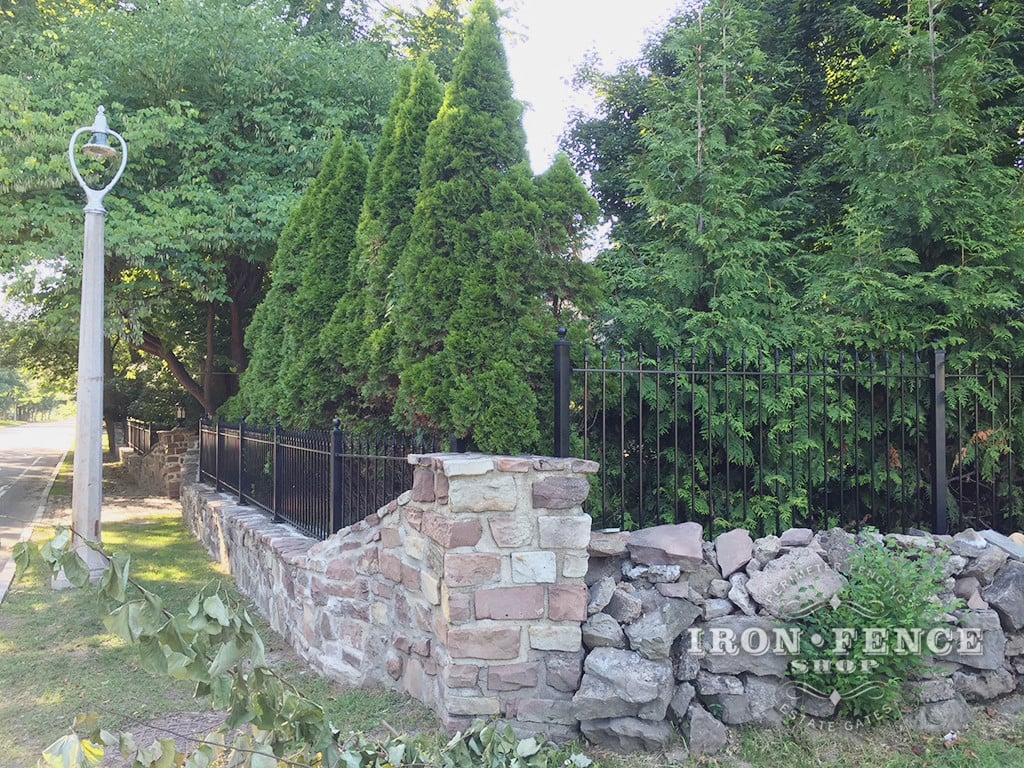 Our 3ft Iron Fence on a Stone Knee Wall Transitioning to 5ft Tall Iron Fence